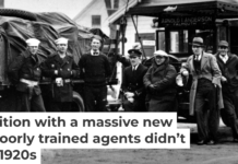 Coast Guardsmen stand in front of two truckloads of liquor seized on April 14, 1931, after a battle between three policemen and several alcohol smugglers near Falmouth, Mass. AP Photo